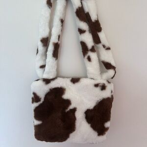 Furry cow print mini tote bag